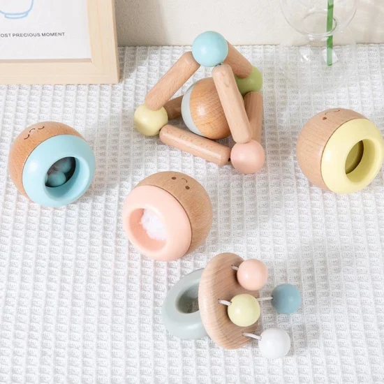 木製リング感覚おもちゃハンドベルの赤ちゃんのためのおもちゃ